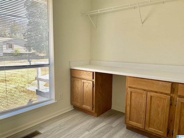 interior space with light hardwood / wood-style floors