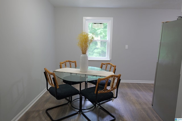 dining room featuring dark hardwood / wood-style flooring