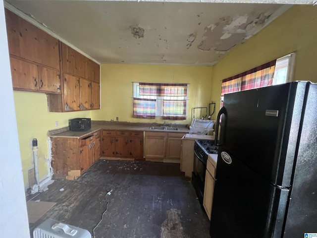 kitchen with sink and black appliances