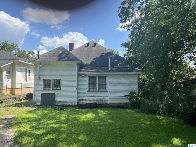 view of home's exterior featuring a yard