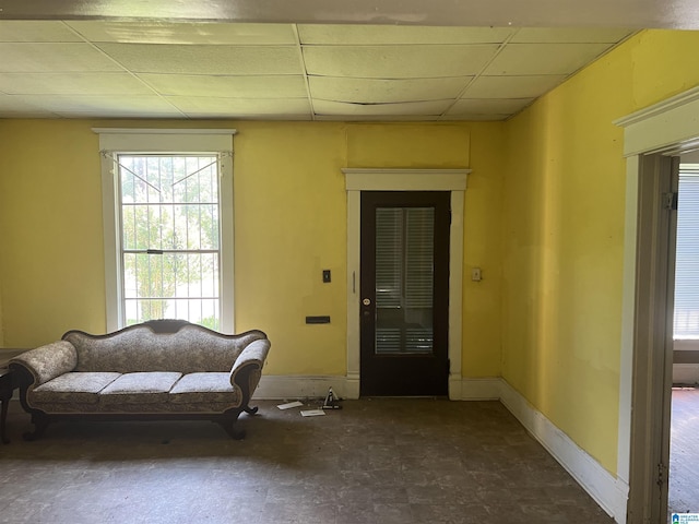 sitting room featuring a paneled ceiling