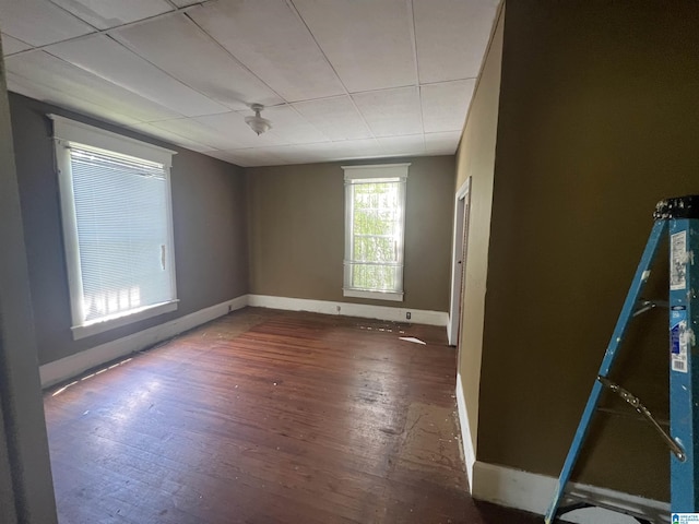 spare room featuring hardwood / wood-style flooring