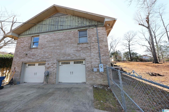 view of property exterior with a garage