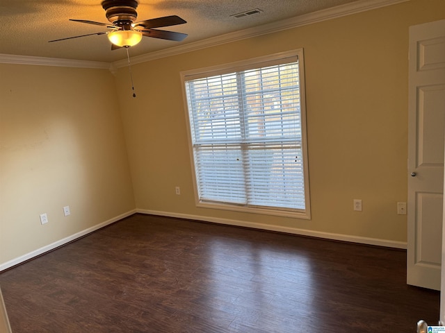 unfurnished room with dark hardwood / wood-style flooring, ornamental molding, and a textured ceiling