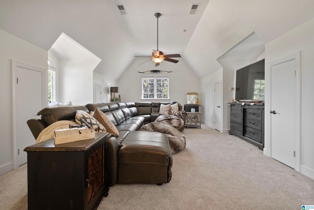 carpeted living room with vaulted ceiling and ceiling fan