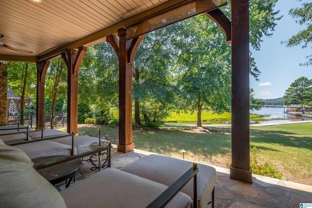 view of patio featuring a water view