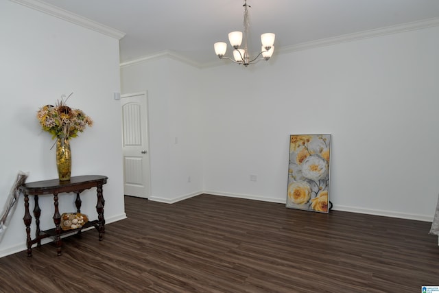 empty room featuring crown molding, an inviting chandelier, and dark hardwood / wood-style flooring