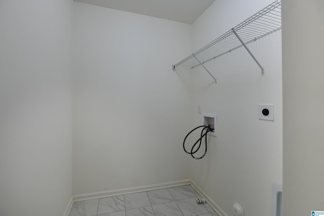 clothes washing area with hookup for a washing machine and hookup for an electric dryer