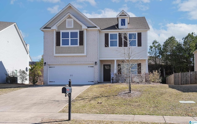 view of front facade with a garage and a front lawn