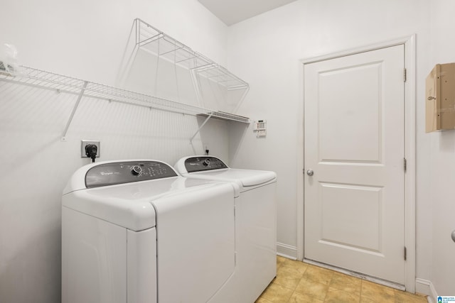 laundry area featuring separate washer and dryer and electric panel