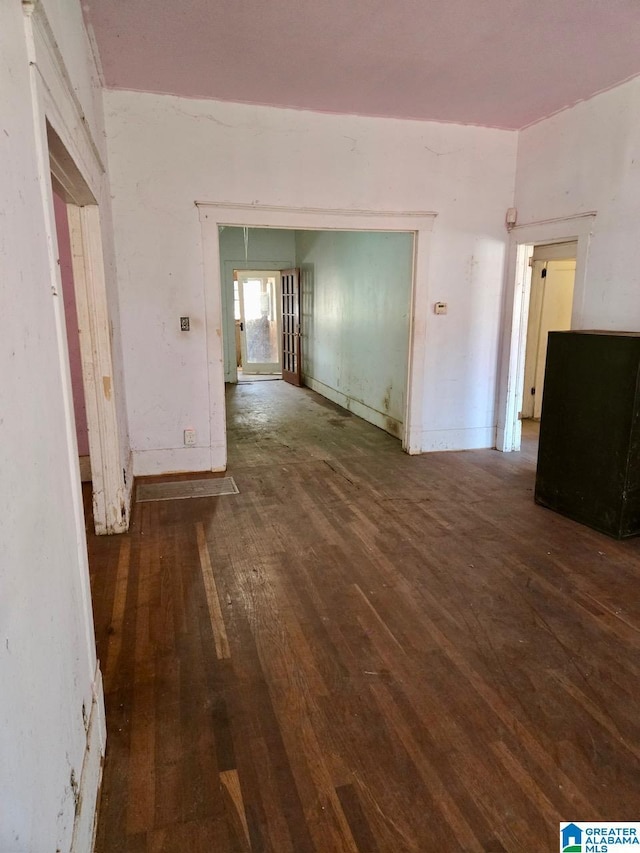 interior space with dark hardwood / wood-style flooring