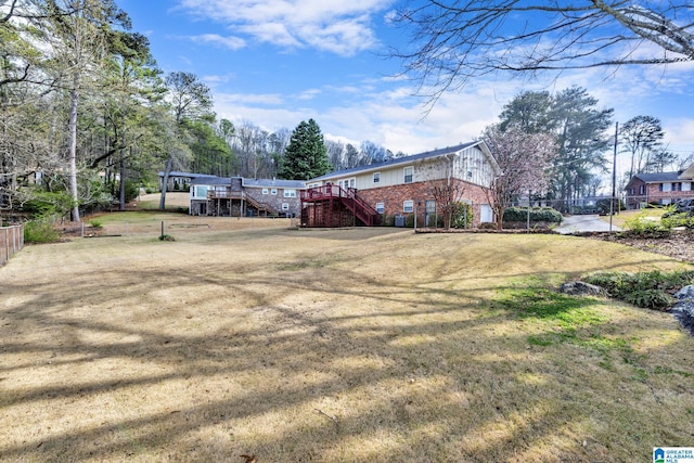 view of yard featuring a deck