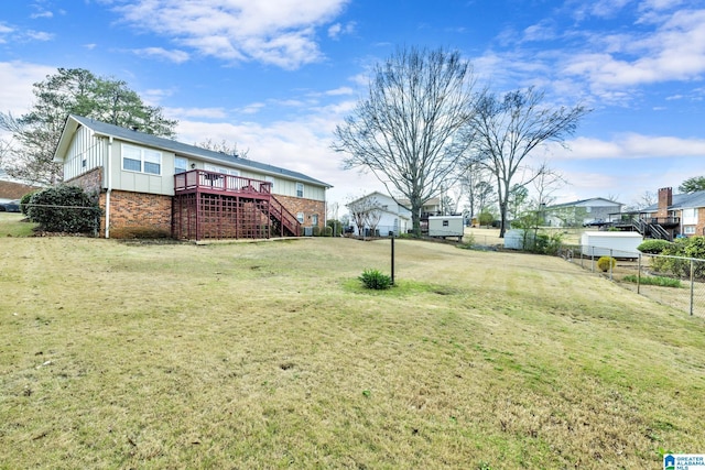 view of yard featuring a deck