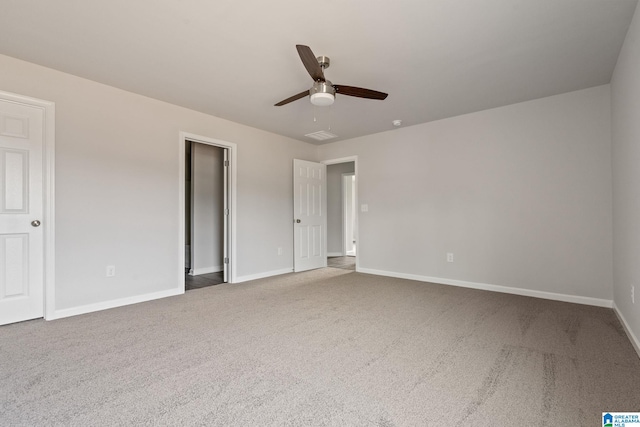 unfurnished bedroom with ceiling fan and carpet floors