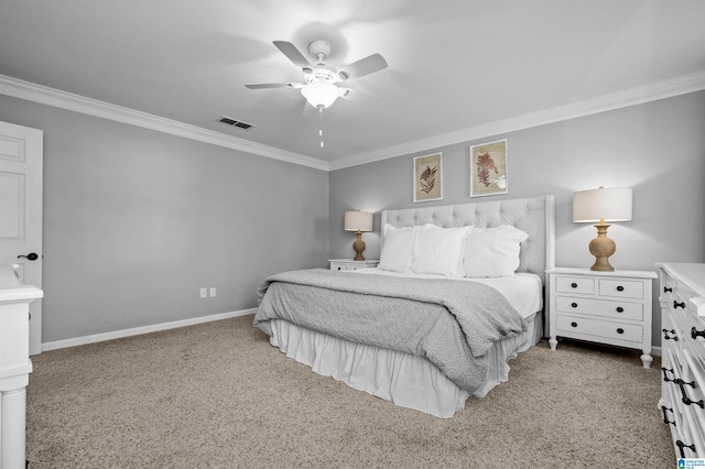 carpeted bedroom with crown molding and ceiling fan