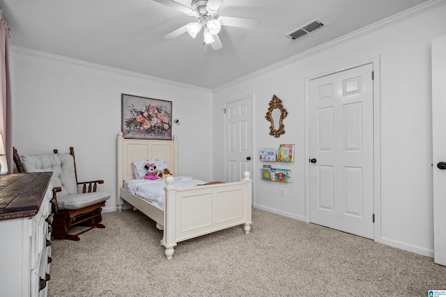 carpeted bedroom with crown molding and ceiling fan