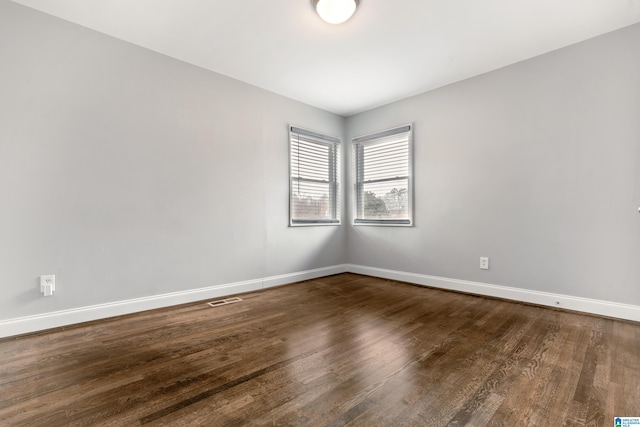 empty room featuring hardwood / wood-style floors