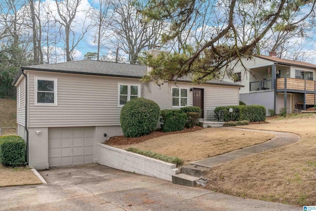 view of front of property with a garage