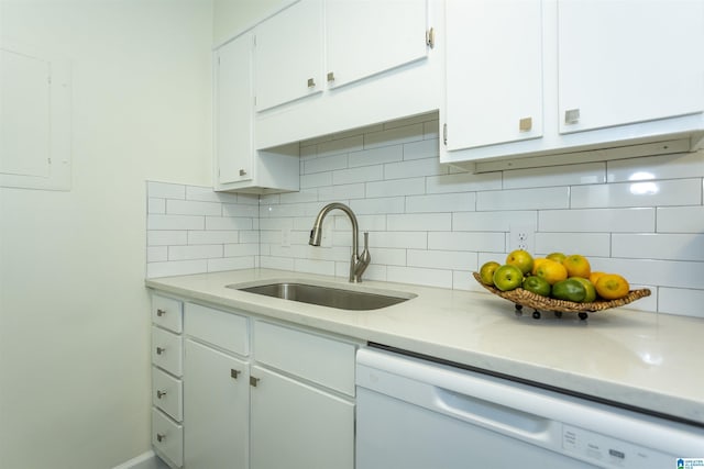 kitchen featuring white cabinetry, sink, tasteful backsplash, and dishwasher