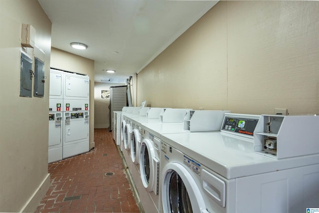 clothes washing area with stacked washer and dryer and independent washer and dryer