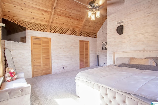 carpeted bedroom with lofted ceiling, wood ceiling, and ceiling fan