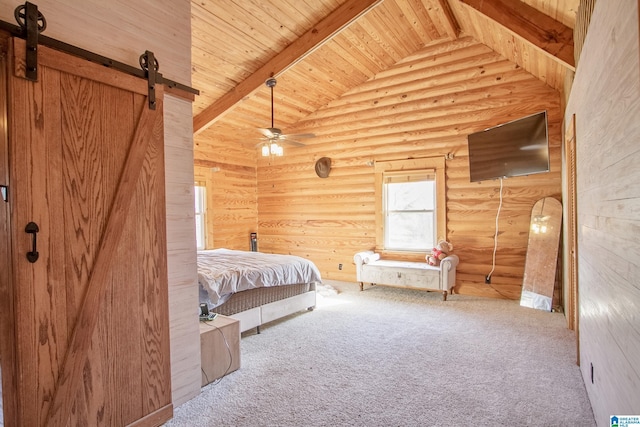 unfurnished bedroom featuring high vaulted ceiling, beamed ceiling, carpet flooring, log walls, and a barn door