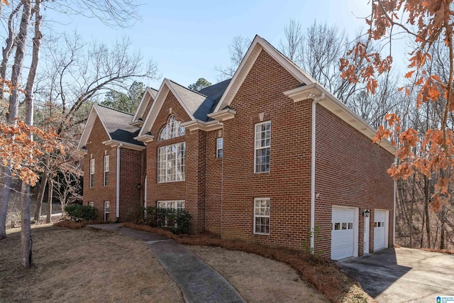 view of side of property featuring a garage