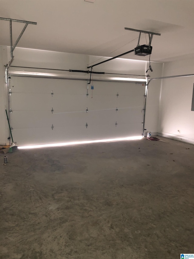 garage featuring a garage door opener