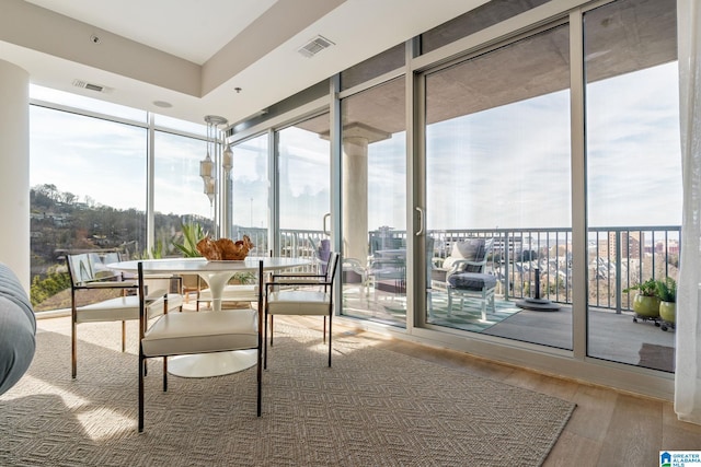 sunroom / solarium featuring a wealth of natural light