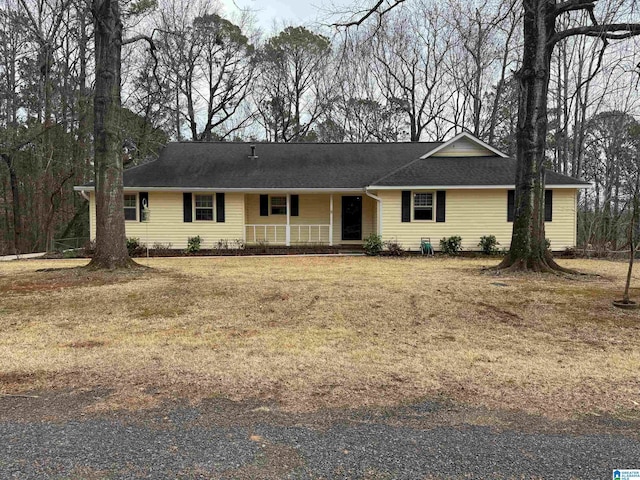 ranch-style house with a front yard