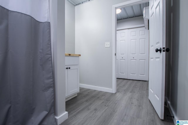 bathroom featuring hardwood / wood-style flooring