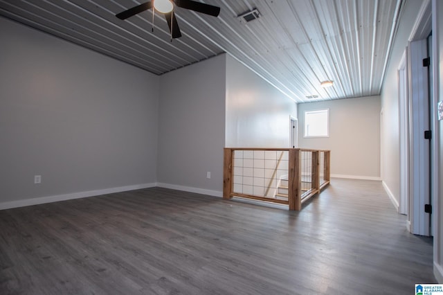 empty room with wood-type flooring and ceiling fan