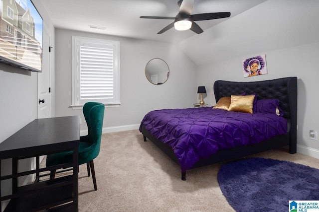 bedroom featuring ceiling fan, lofted ceiling, and carpet