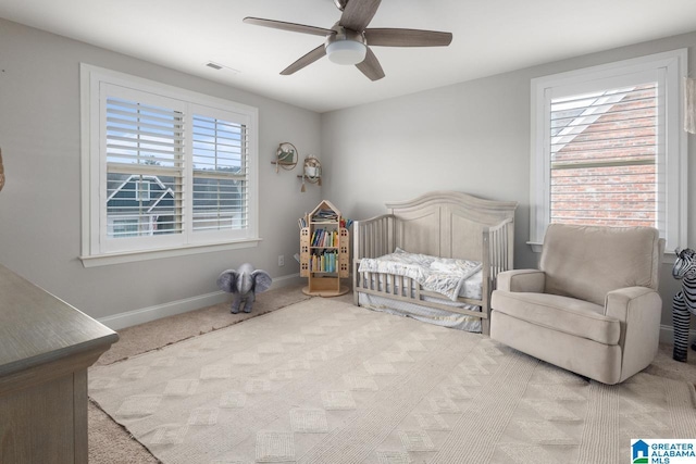 bedroom with carpet and ceiling fan