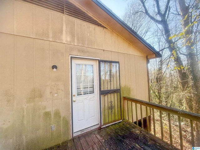 entrance to property featuring a deck