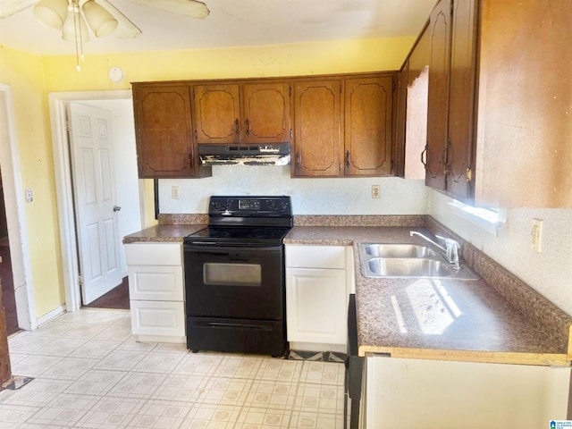 kitchen with black / electric stove, sink, and ceiling fan