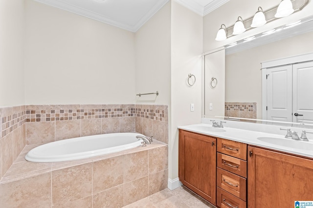 bathroom featuring tiled tub, ornamental molding, tile patterned flooring, and vanity