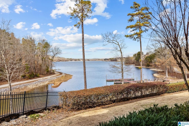 view of water feature with fence