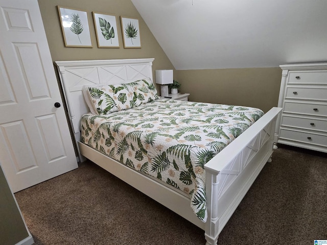 carpeted bedroom featuring vaulted ceiling