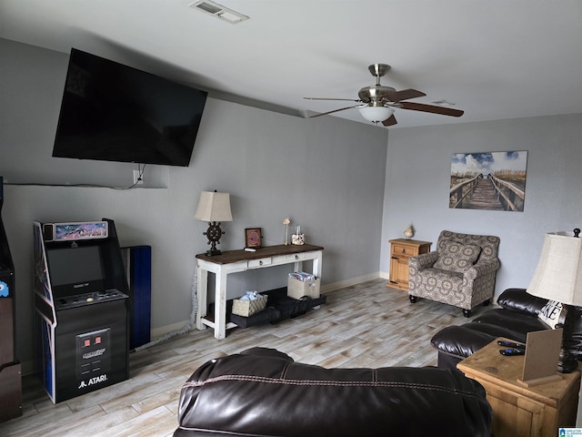 living room with ceiling fan