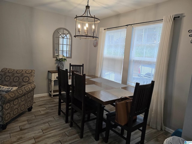 dining room featuring a notable chandelier