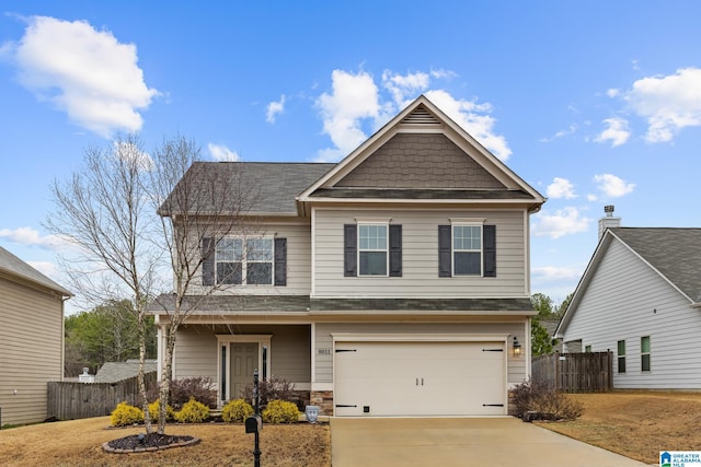 craftsman house with a garage