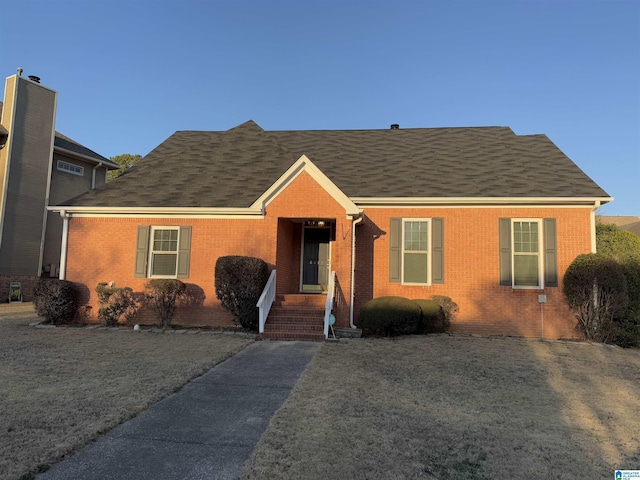 view of front of home with a front lawn