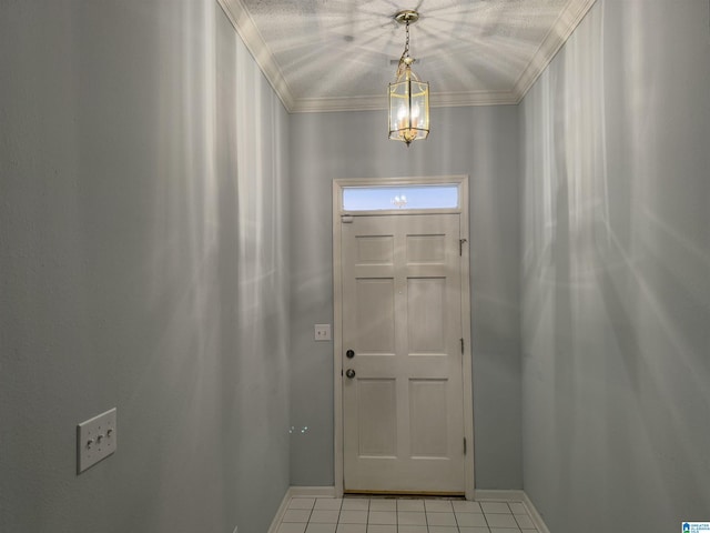 doorway to outside featuring a notable chandelier, ornamental molding, and light tile patterned floors