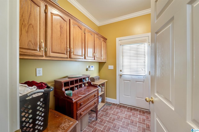 laundry room featuring crown molding