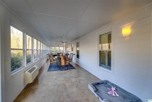 sunroom featuring a wall unit AC