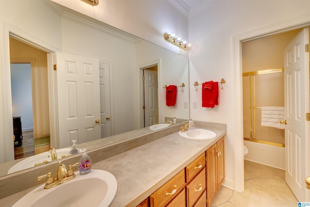 full bathroom featuring vanity, ornamental molding, enclosed tub / shower combo, and toilet