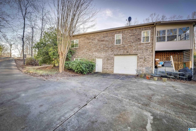 exterior space with a garage