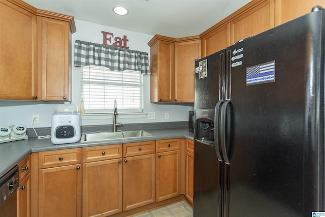 kitchen with sink and black appliances