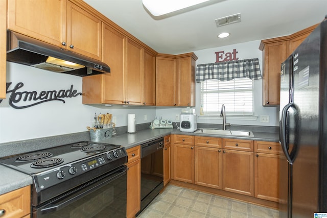 kitchen featuring sink and black appliances